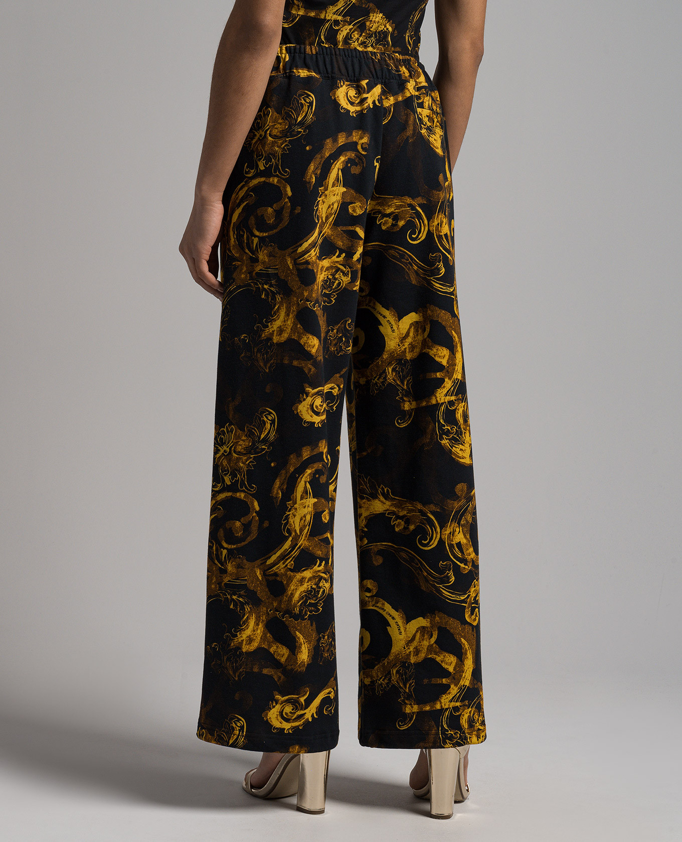 Black pants in Watercolor Couture print Versace Jeans Couture 4