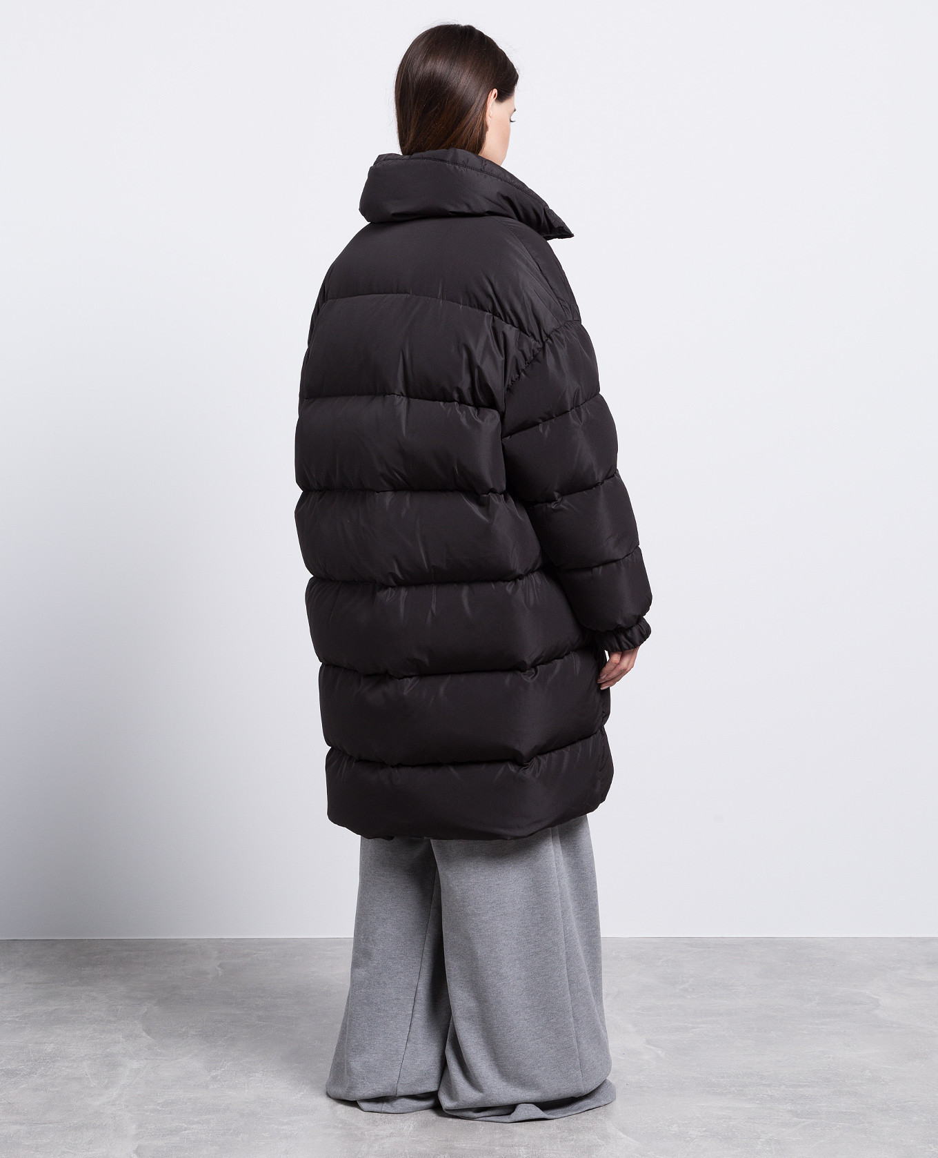 Black quilted down jacket with a brooch Giuseppe Di Morabito Milano 4
