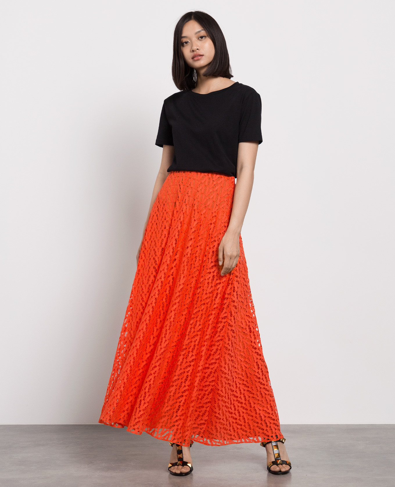 

Orange perforated skirt Valentino