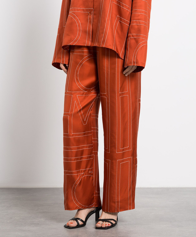 パンツ TOTEME Silk trousers with monogram logo embroidery Toteme Monogram-Embroidered Silk Pajama Pants | Neiman Marcus