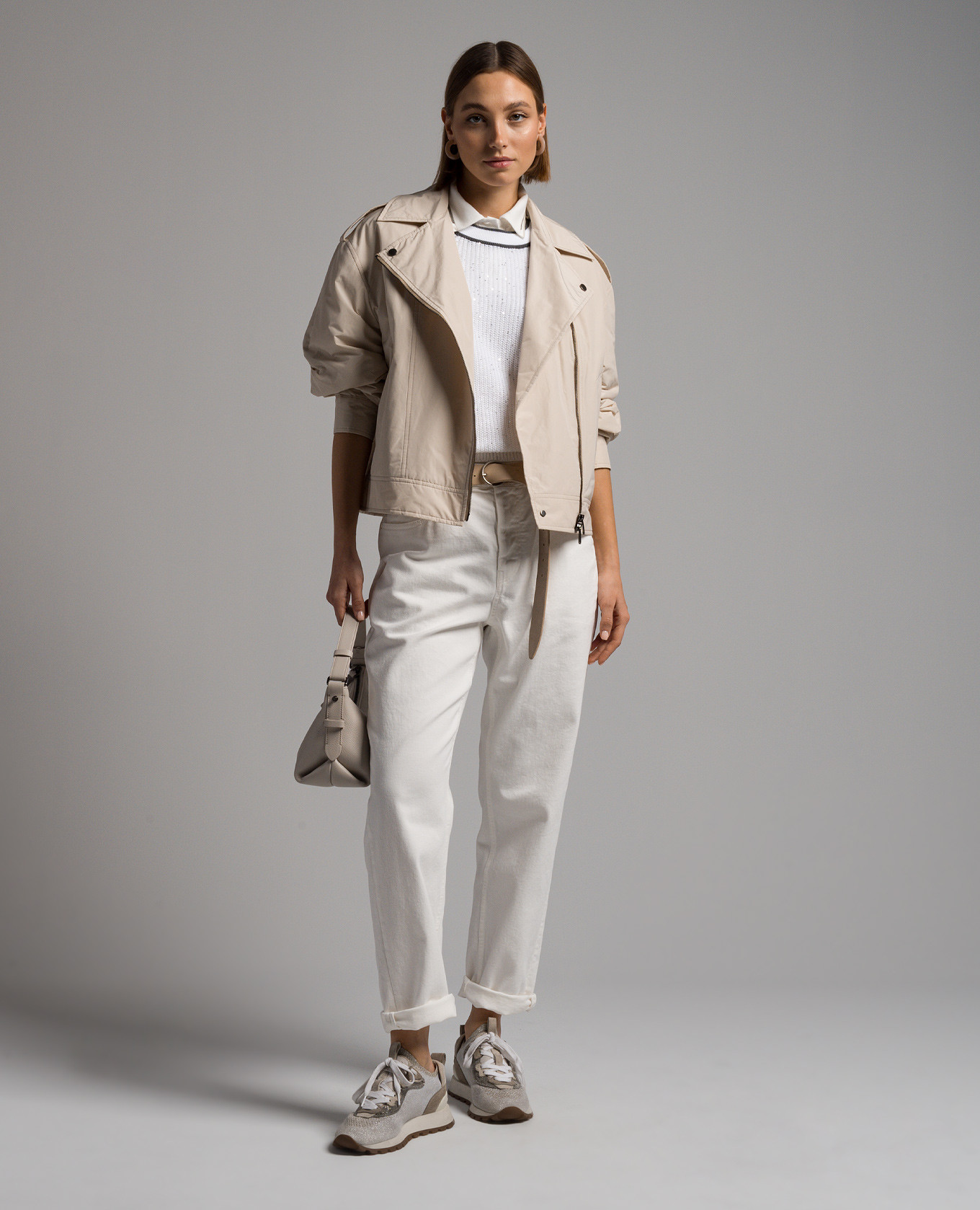 

Beige jacket in the style of a cowhide with a monil chain Brunello Cucinelli