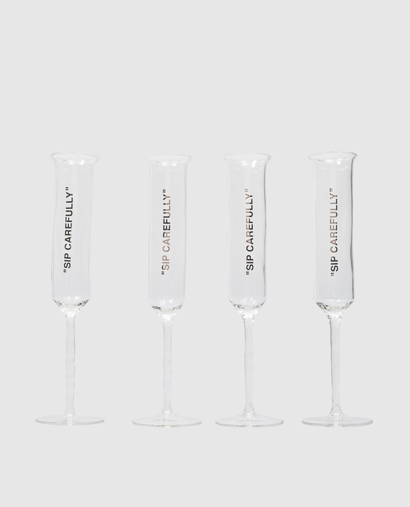 

Set of glasses with the quote Sip Carefully Off-White, Transparent