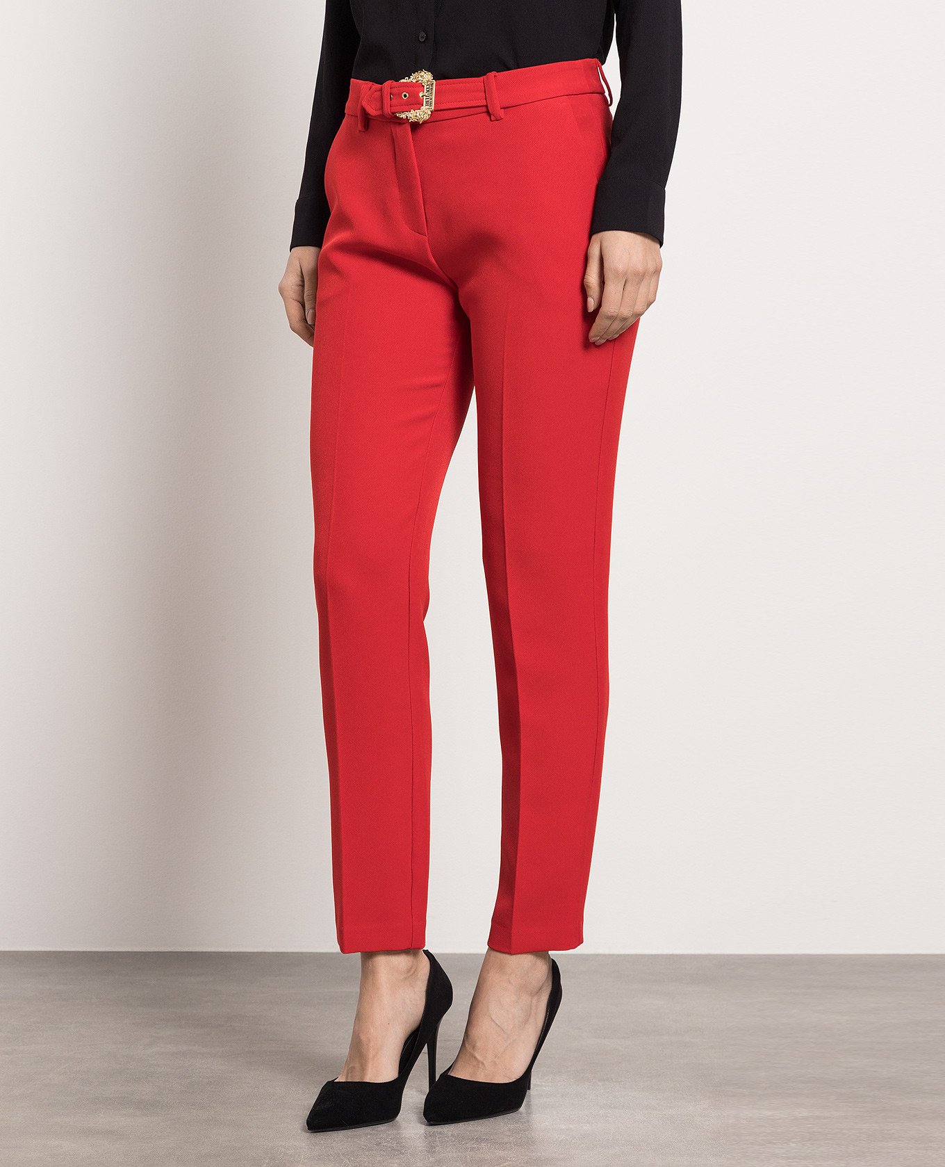 

Red pants with a buckle in the baroque style Versace Jeans Couture