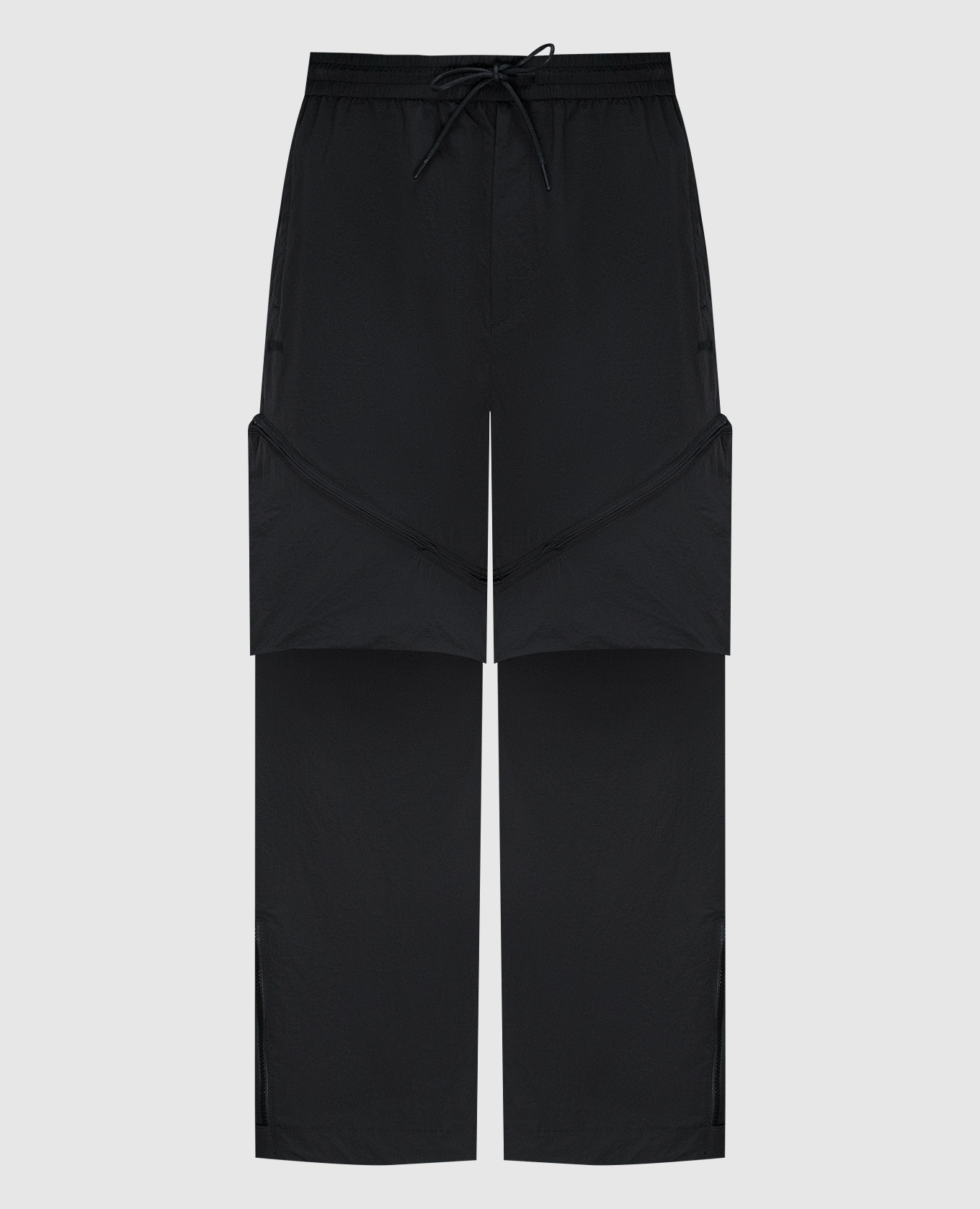 

Black pants transformers with a logo Juun.j