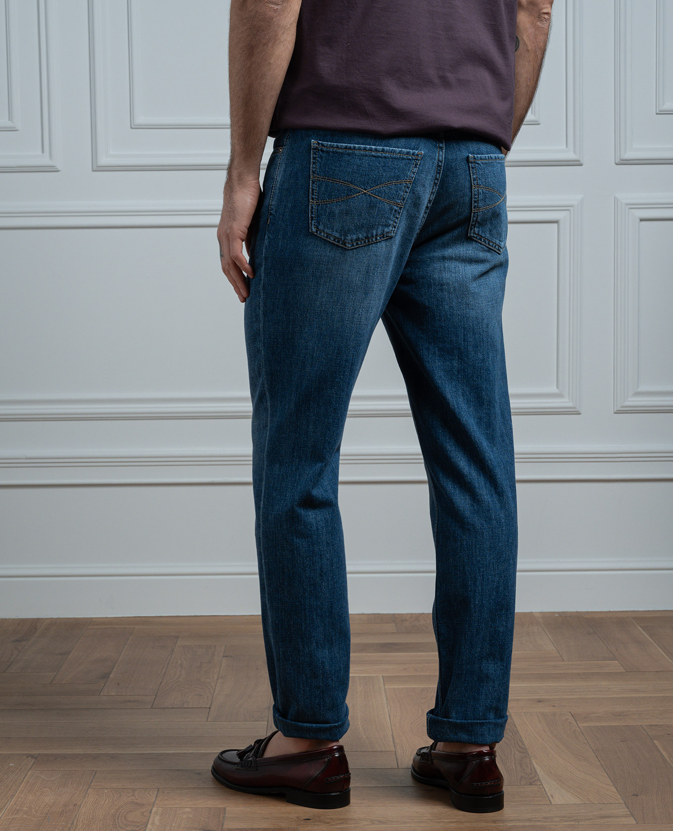 

Blue jeans with a distressed effect Brunello Cucinelli