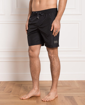 Dolce&Gabbana Black swim shorts with logo patch M4E45TFUSFW