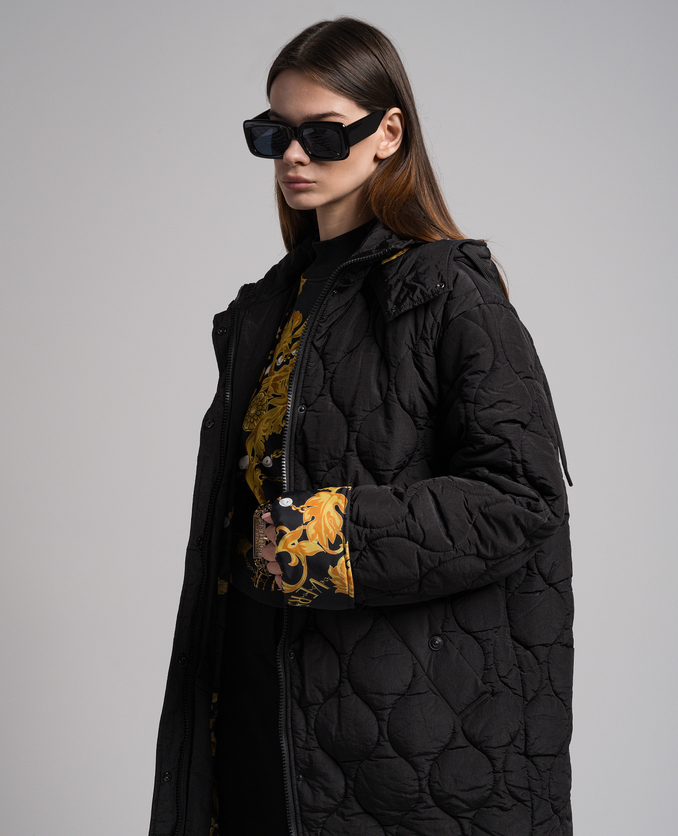 

Black quilted jacket with Chain Couture print Versace Jeans Couture