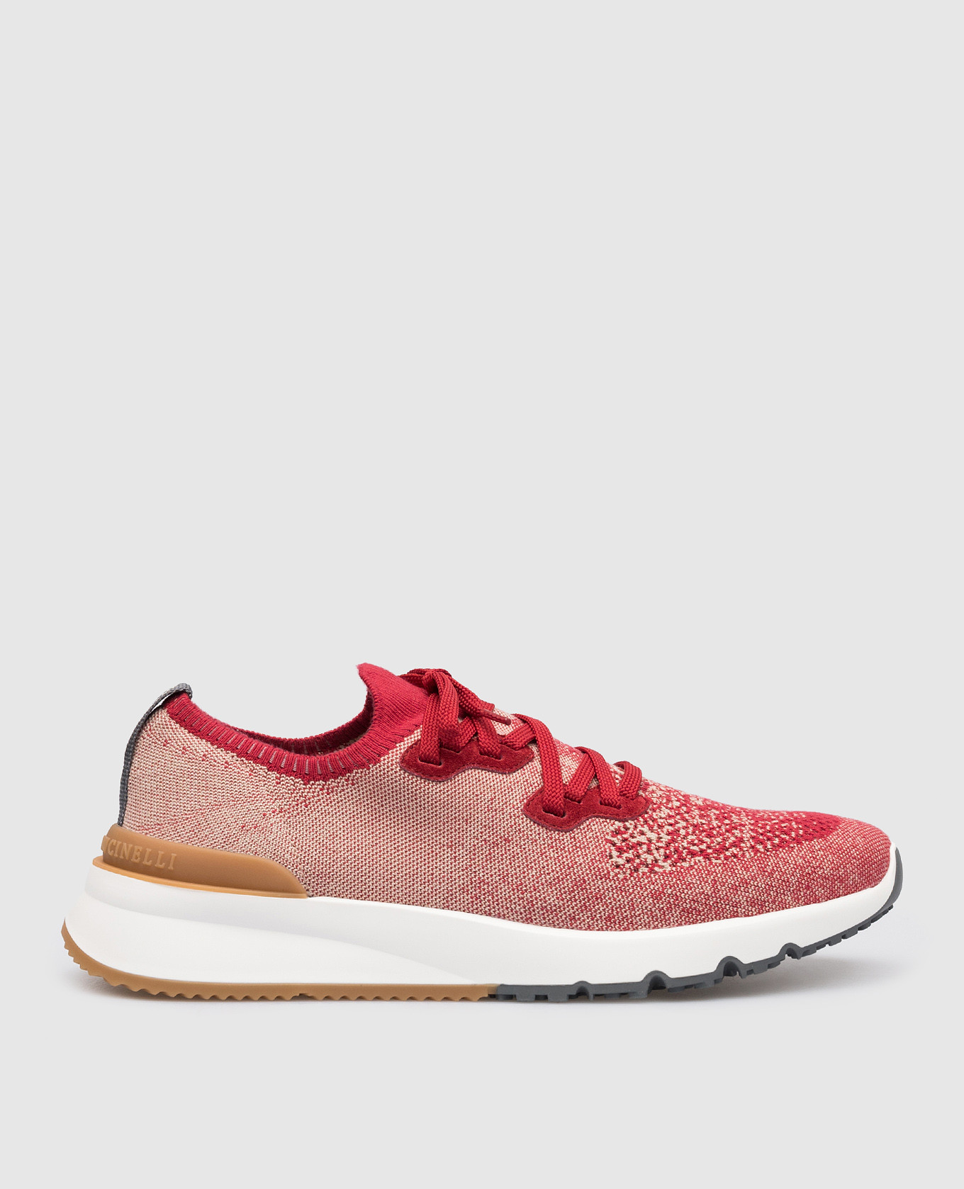 Red sneakers with a textured logo brunello cucinelli
