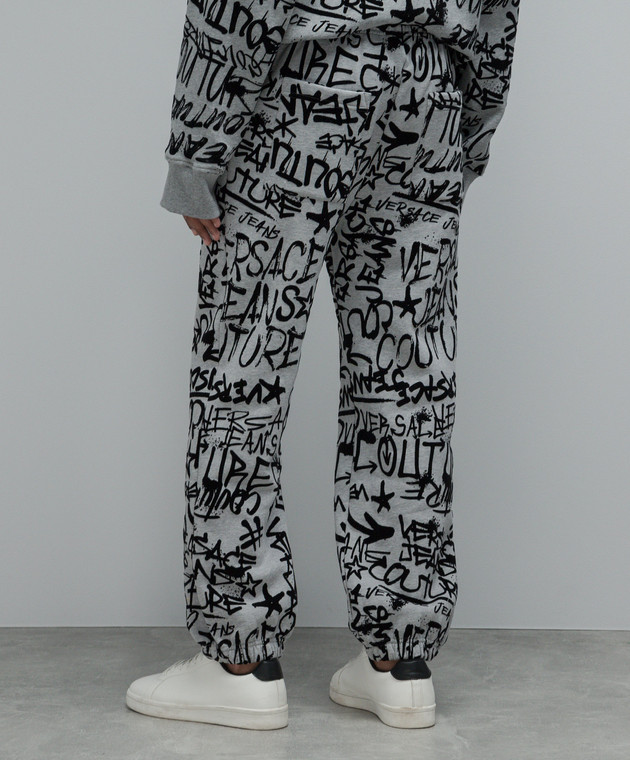 Versace Jeans Couture Gray joggers with textured graffiti print 75GAA315FS095 buy with Portugal delivery at Symbol