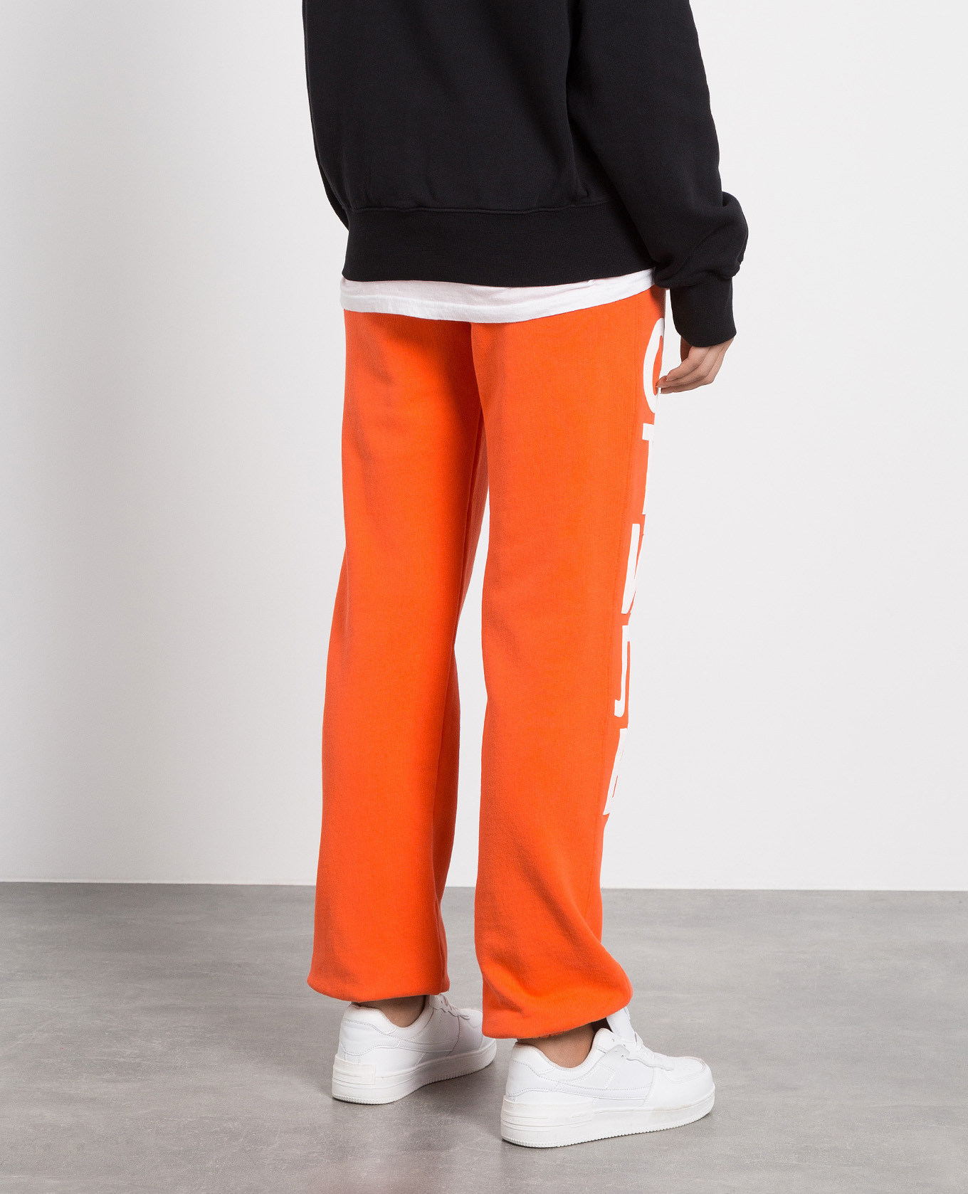 Orange jogger with print style Heron Preston 4
