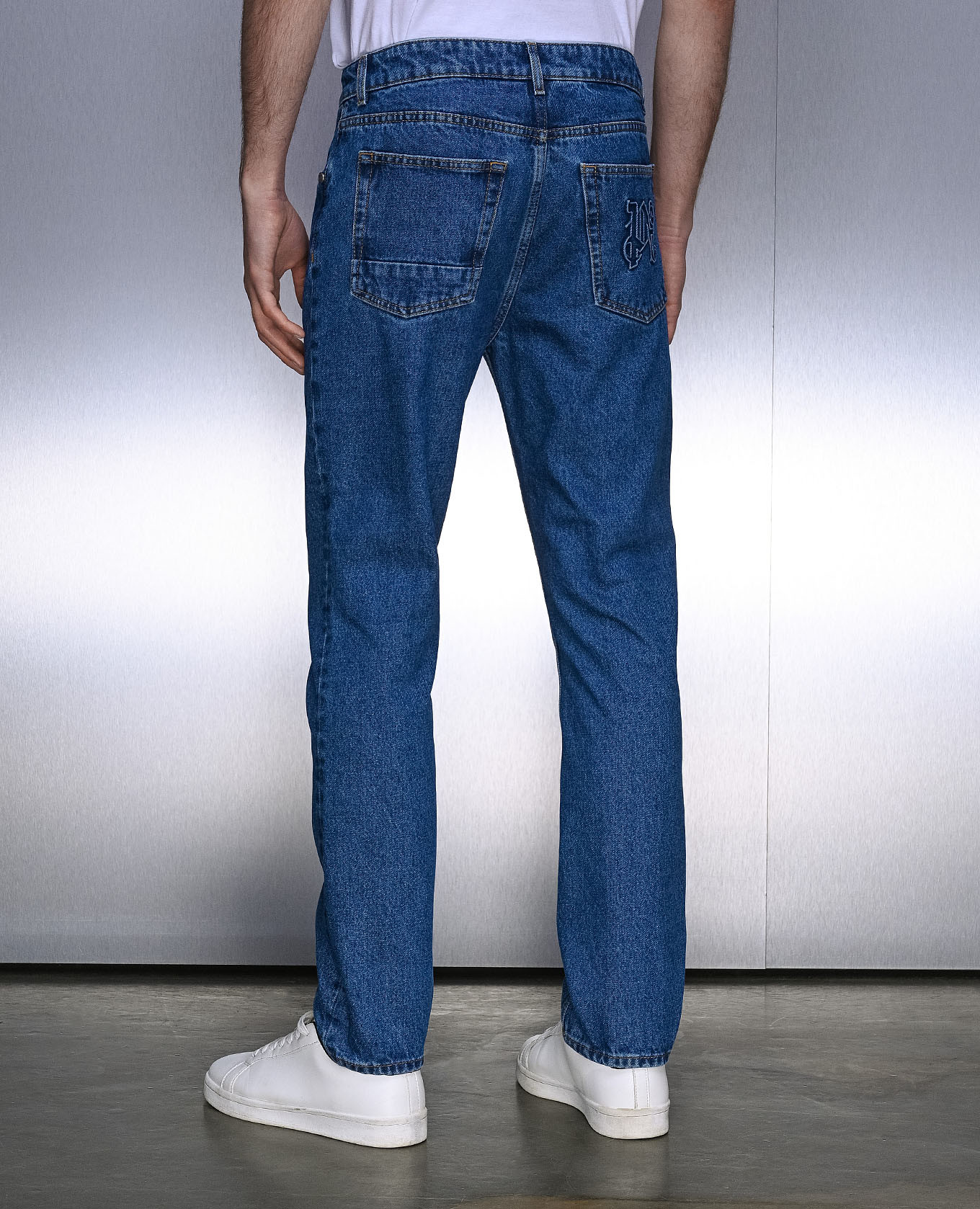 

Blue jeans with logo monogram Palm Angels