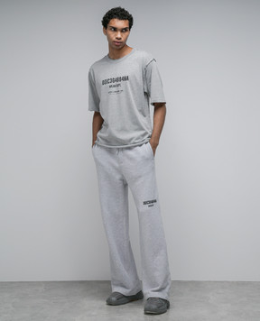 Dolce&Gabbana Gray sweatpants with holes and a print GVZ7ATG7KX9