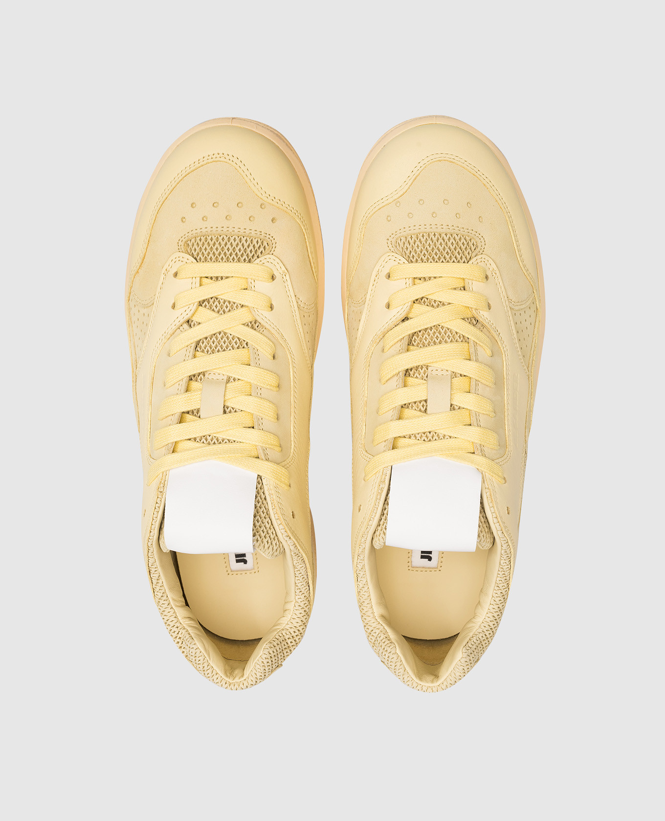 

Yellow leather sneakers with a logo Jil Sander