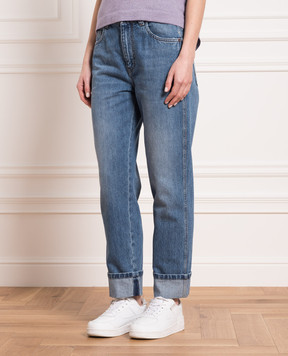 Brunello Cucinelli Blue jeans with a distressed effect MA095P5595