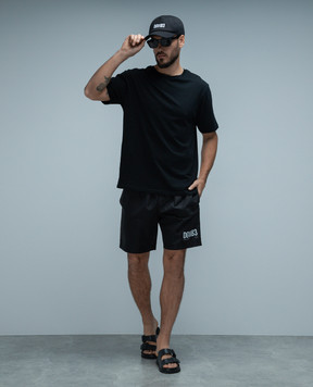 Dolce&Gabbana Black swim shorts with branded print M4F25TFUSFW
