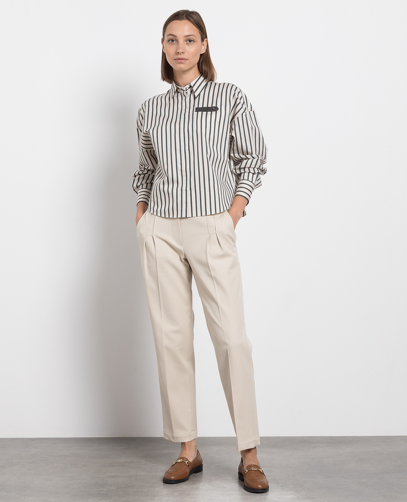 

Beige pants with monil chain Brunello Cucinelli