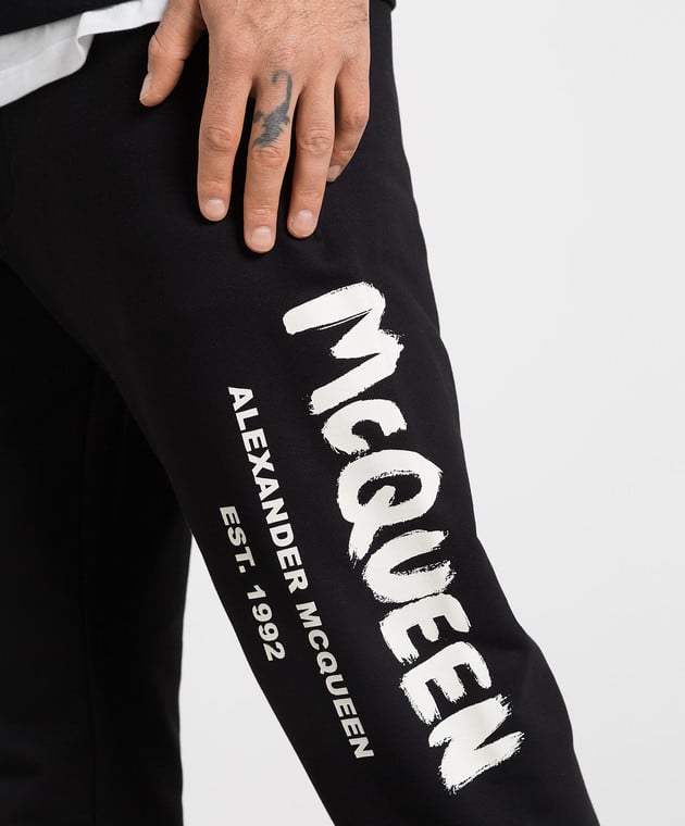 Alexander McQueen - Black joggers with contrasting McQueen Graffiti print  688714QSZ81 - buy with Czech Republic delivery at Symbol