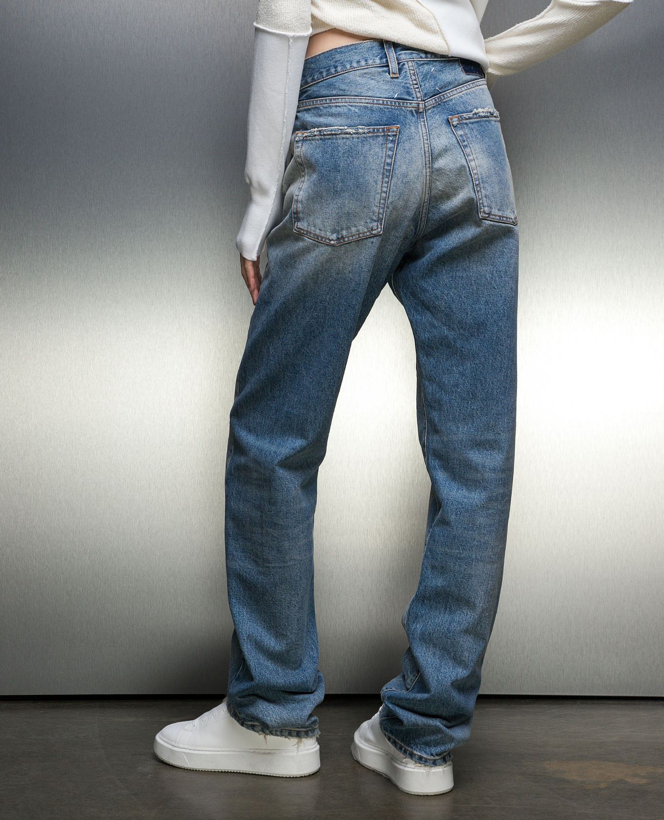 

Blue jeans with a distressed effect Maison Margiela