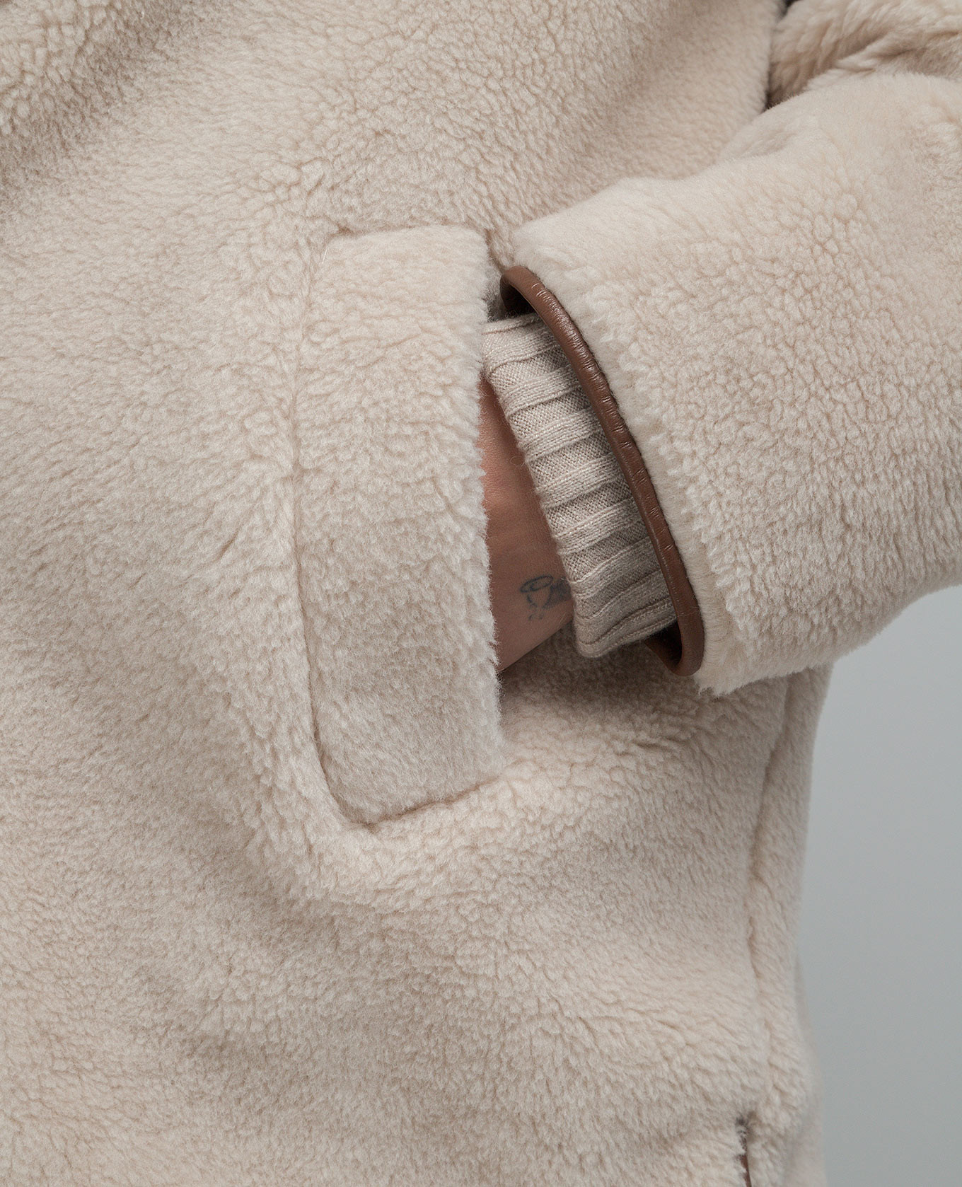 

White coat with leather inserts Enrico Mandelli