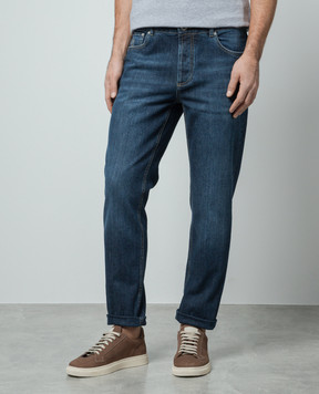Brunello Cucinelli Blue distressed jeans with a logo patch M283PD3210