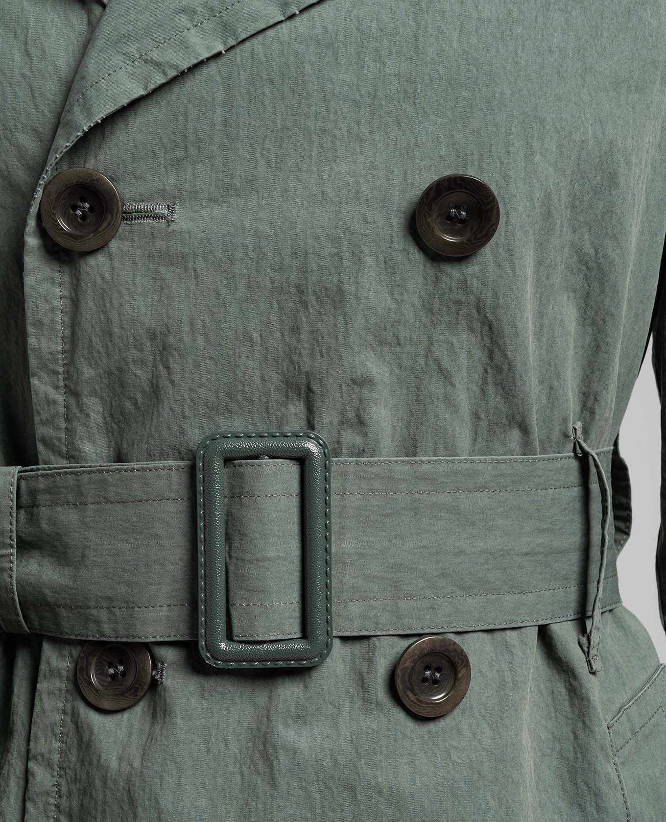 

Green trench coat with a reaper effect Maison Margiela