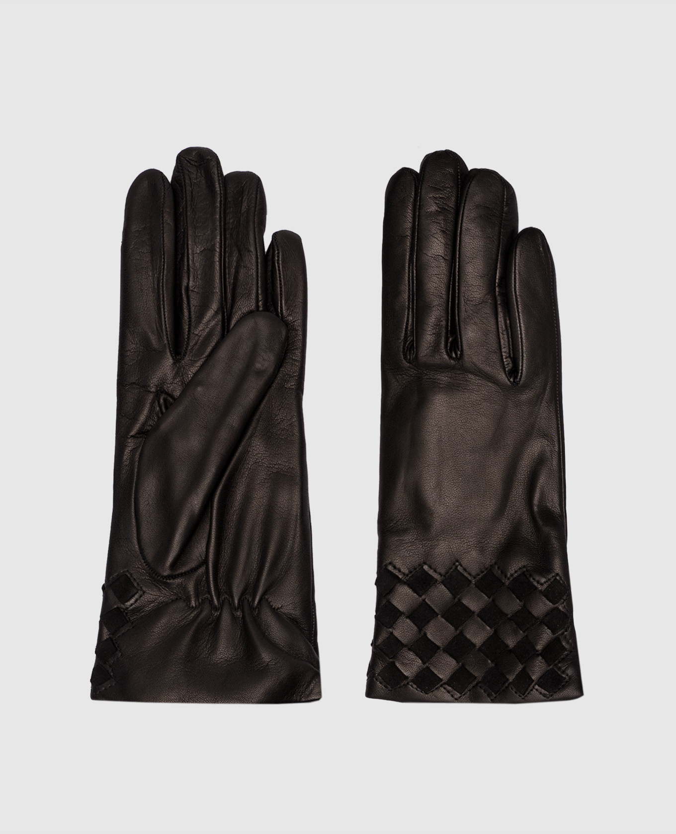 

Black leather gloves with weaving Caridei