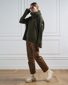 Moncler Green wool sweater with a free cut 9F00015M1241