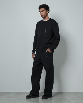 Balmain Black sweatpants with textured logo CH1OB214BC61