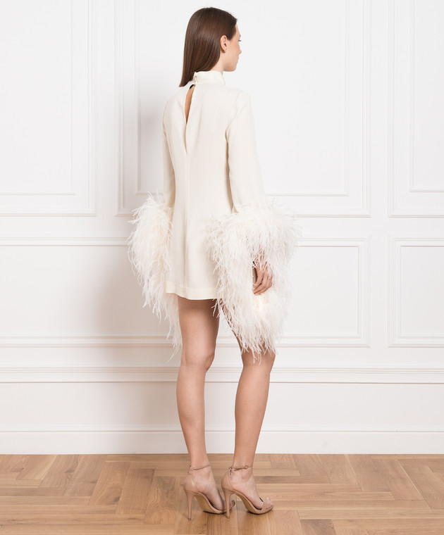 ostrich feather dress white Unique Sequin Chicken Trumpet Prom length gown has a backless design and fitted bodice for a striking silhouette The Lynn Mini Ostrich Feather