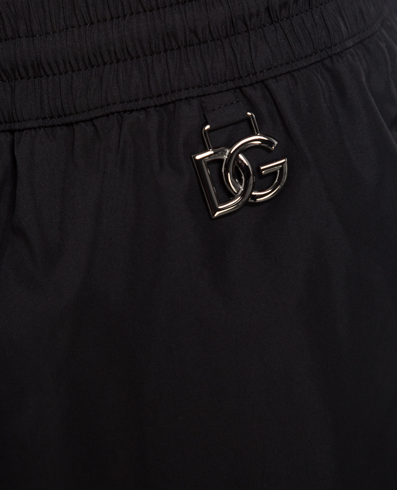 

Black swim shorts with metallic DG logo Dolce&Gabbana