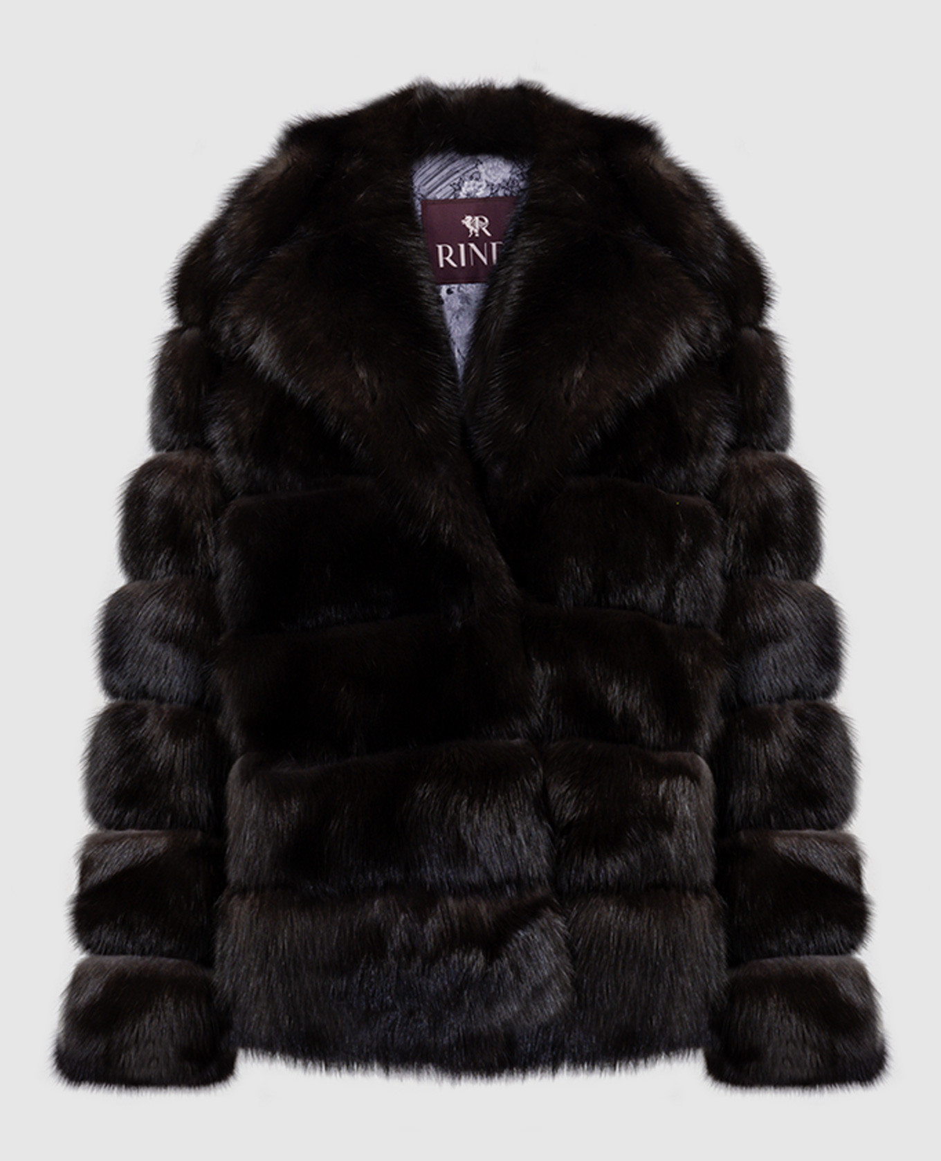 Rindi - Un abrigo de piel marrón hecho de piel de marta con cuello ...