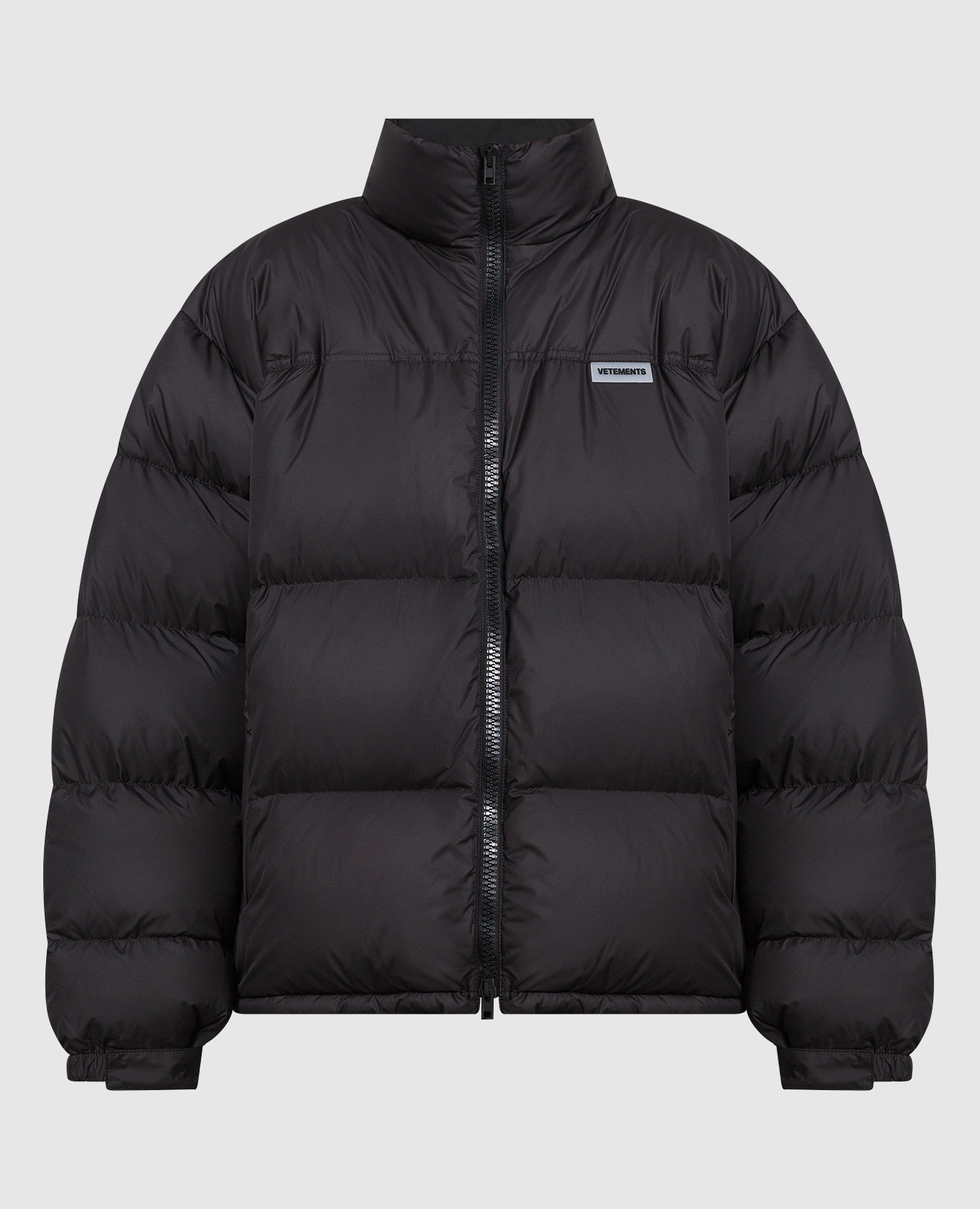 Vetements - Black down jacket with horizontal stripes quilting