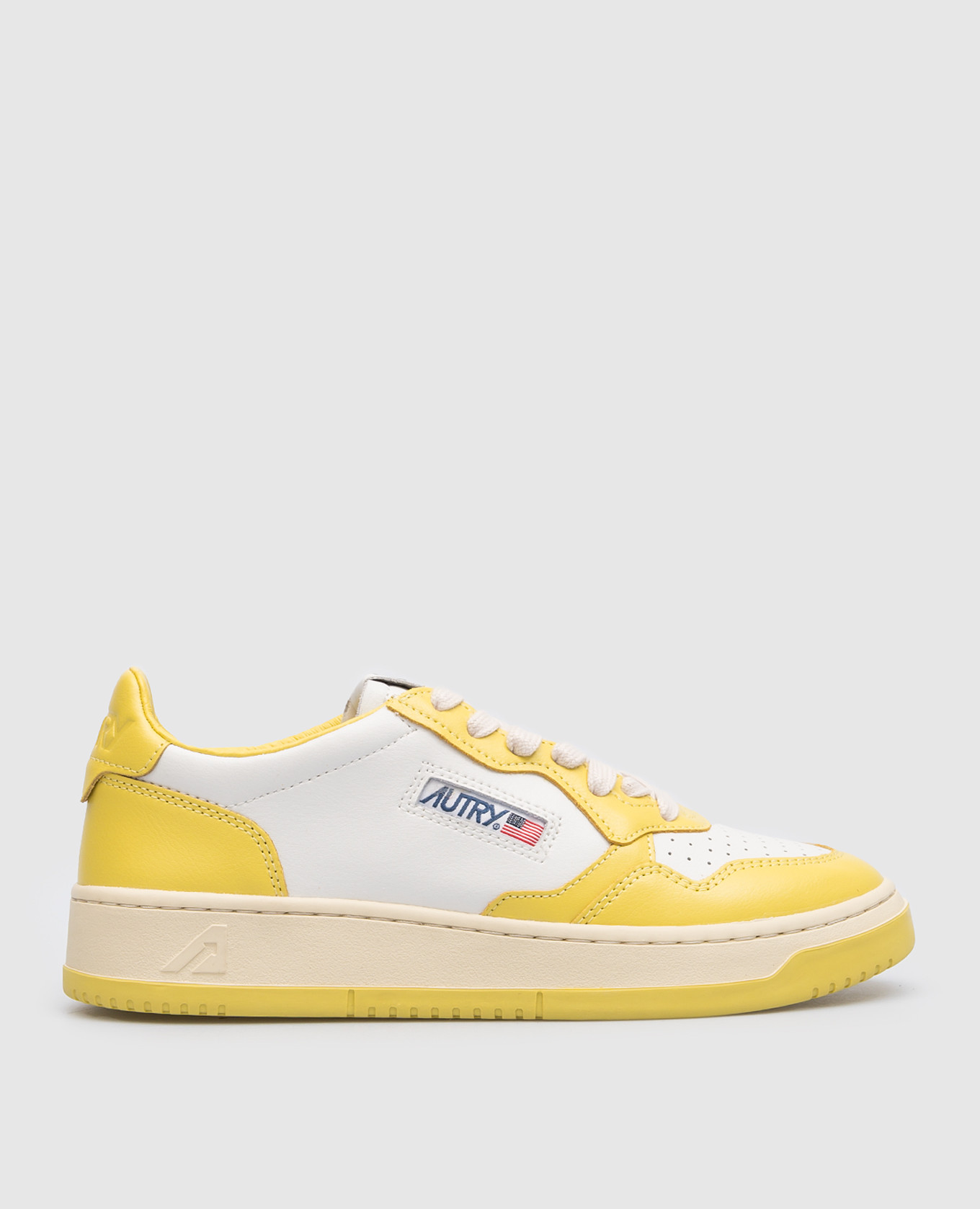 Yellow leather sneakers with a logo autry